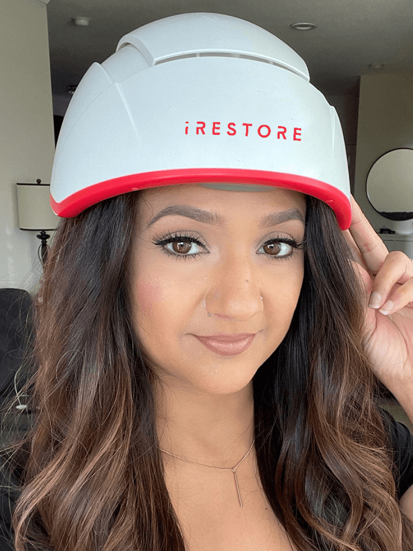 Image of Deepa Berar wearing the Professional helmet device.