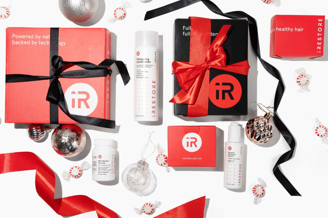 Top view image showing the REVIVE Max Growth Kit with Christmas decors surrounding it.