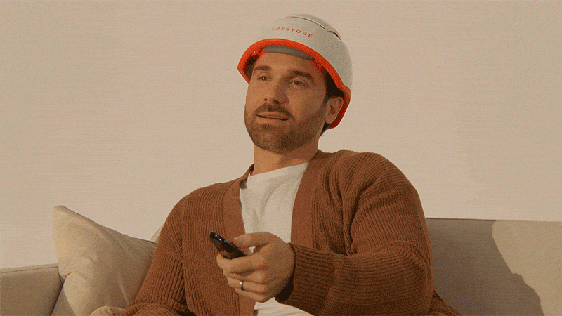 GIF showing the ease of using the helmet device while doing a anything such as watching movies, working from home, or just having your coffee.