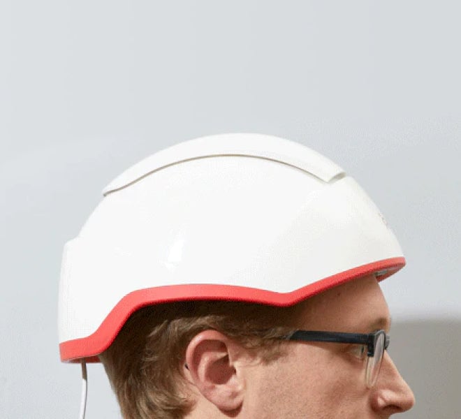 Close up image of a man wearing the Professional Device in side view angle.