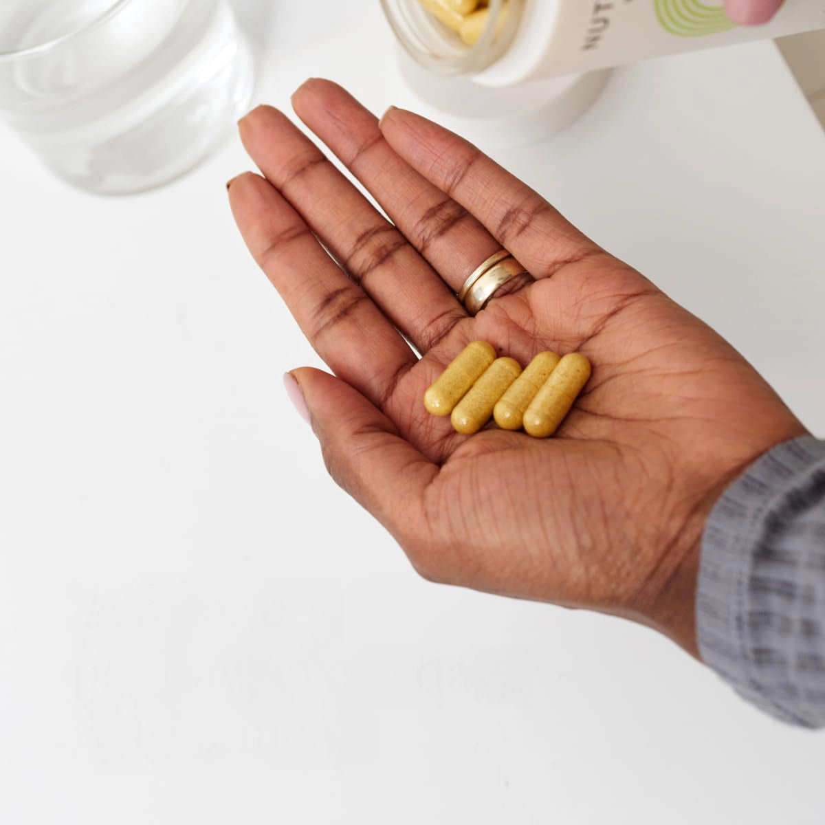 Nutrafol in woman hand